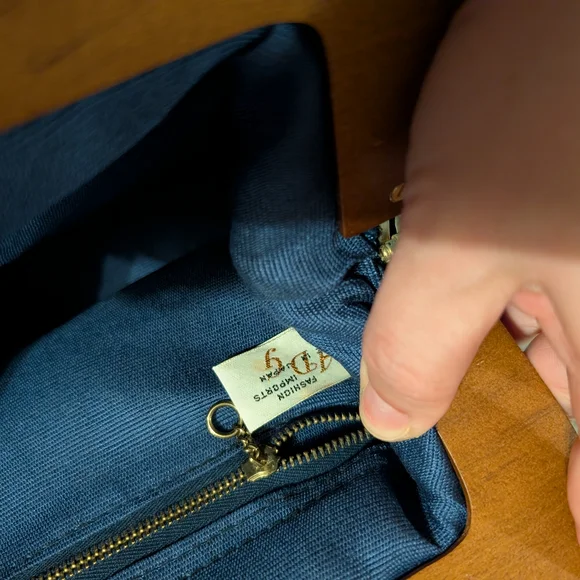 Elegant Navy Woven Clutch with Wooden Handle - Picture 7 of 9